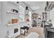 Well-organized walk-in closet with shelving, hanging racks, and ample storage space at 3128 Dark Sky Dr, Harmony, FL 34773