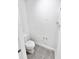 A bathroom with a toilet and tiled floor at 3219 Cup Dr, Lakeland, FL 33803