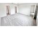 Spacious bedroom features plush carpet, ensuite bathroom and walk-in closet at 3219 Cup Dr, Lakeland, FL 33803