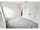 Bedroom featuring a window, carpet flooring, and neutral paint at 3219 Cup Dr, Lakeland, FL 33803