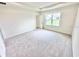 Bedroom with neutral carpet and natural light at 3219 Cup Dr, Lakeland, FL 33803