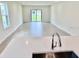 View of the living room from the kitchen island at 3219 Cup Dr, Lakeland, FL 33803