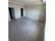 Spacious Primary bedroom with ample natural light and multiple doors at 3219 Cup Dr, Lakeland, FL 33803