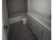 Well-appointed bathroom with a bathtub, tiled shower, and updated vanity at 3352 Cup Dr, Lakeland, FL 33803