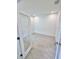 Bright and airy bedroom with tiled floors and recessed lighting, offering a clean, contemporary space at 3352 Cup Dr, Lakeland, FL 33803