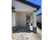 Inviting front porch with stone-accented columns and a welcoming entrance, perfect for enjoying quiet moments at 3352 Cup Dr, Lakeland, FL 33803