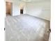 A large carpeted main bedroom boasts an attached bathroom and a walk-in closet at 3352 Cup Dr, Lakeland, FL 33803