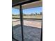 Screened-in patio overlooking a picturesque golf course, perfect for enjoying outdoor living and relaxation at 3352 Cup Dr, Lakeland, FL 33803