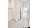 Walk-in closet featuring plush carpeting and built-in wire shelving at 3352 Cup Dr, Lakeland, FL 33803