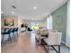 Spacious open-concept layout connecting kitchen, dining, and living areas for modern living and socializing at 3629 Marlberry Way, Sanford, FL 32773