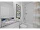 Clean bathroom with a granite countertop sink and a shower-tub combination at 3635 Marlberry Way, Sanford, FL 32773