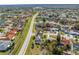 Aerial view of the home and surrounding neighborhood, close to amenities at 401 Cart Ct, Kissimmee, FL 34759