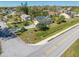 Well-maintained house features solar panels, a driveway, and manicured landscaping at 401 Cart Ct, Kissimmee, FL 34759