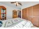Bedroom with closet space and a view into the hallway at 401 Cart Ct, Kissimmee, FL 34759