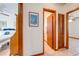 Hallway view with doorways to bedrooms and bathroom at 401 Cart Ct, Kissimmee, FL 34759