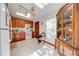 Well-lit kitchen with wood cabinetry and a ceiling fan at 401 Cart Ct, Kissimmee, FL 34759