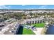 Aerial view of complex featuring a pool, beach access, and lake with docks at 4117 Fairview Vista Pt # 206, Orlando, FL 32804
