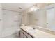 Full bathroom featuring tub and shower combo, vanity, and bright lighting at 4117 Fairview Vista Pt # 206, Orlando, FL 32804
