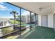 Screened patio featuring views of the pool and lake at 4117 Fairview Vista Pt # 206, Orlando, FL 32804