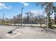 Fenced tennis court view showcasing the community's recreational amenities and outdoor activity space at 4117 Fairview Vista Pt # 206, Orlando, FL 32804