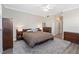 Bedroom features a ceiling fan, neutral walls, wood-look floors, and natural light at 509 W King St, Orlando, FL 32804