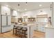 Well-lit kitchen with a center island, modern appliances, and plenty of counter space at 535 N Interlachen Ave # 106, Winter Park, FL 32789