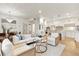 Open-concept living space with a seamless flow between the living, dining, and kitchen areas at 535 N Interlachen Ave # 106, Winter Park, FL 32789