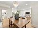 Open-concept living space combining dining, living, and kitchen areas at 535 N Interlachen Ave # 106, Winter Park, FL 32789