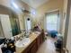Large bathroom with double sink vanity, mirror, tile floors and separate toilet area at 6640 S Goldenrod Rd # 118B, Orlando, FL 32822