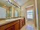 Bathroom boasts double sinks, tile floor, and a separate shower for added convenience at 6640 S Goldenrod Rd # 118B, Orlando, FL 32822