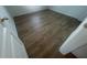 Bright bedroom features light wood-look floors and white trim at 6640 S Goldenrod Rd # 118B, Orlando, FL 32822