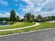 Picturesque community view with pond, fountain and clubhouse access at 6640 S Goldenrod Rd # 118B, Orlando, FL 32822