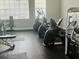 A bright fitness center with elliptical machines, and weight training equipment at 6640 S Goldenrod Rd # 118B, Orlando, FL 32822