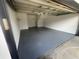Garage space with a sealed floor and overhead lighting at 6640 S Goldenrod Rd # 118B, Orlando, FL 32822