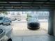 Open garage with view of cars in front of townhomes in this spacious community at 6640 S Goldenrod Rd # 118B, Orlando, FL 32822