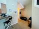 Hallway featuring neutral walls, modern lighting, and connecting spaces for seamless flow and functionality at 6640 S Goldenrod Rd # 118B, Orlando, FL 32822
