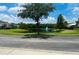 Picturesque community pond with a fountain, offering a serene and scenic view within the neighborhood at 6640 S Goldenrod Rd # 118B, Orlando, FL 32822