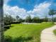 A sand volleyball court with picturesque view of pond and fountain at 6640 S Goldenrod Rd # 118B, Orlando, FL 32822
