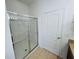 Tiled walk-in shower with a glass enclosure at 6640 S Goldenrod Rd # 118B, Orlando, FL 32822
