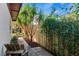 Beautiful landscaping and a wood fence provide privacy in this home's side yard at 767 Baffie Ave, Winter Park, FL 32789