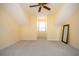Bright, carpeted room featuring a window and a mirror, offering a versatile space with natural light at 7691 Heritage Crossing Way # C-1, Reunion, FL 34747