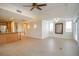 Open floor plan featuring hardwood floors and sliding glass doors to a balcony at 7691 Heritage Crossing Way # C-1, Reunion, FL 34747