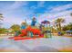 Fun water park with colorful slides and water features, perfect for Gathering fun at 7691 Heritage Crossing Way # C-1, Reunion, FL 34747