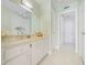 Bathroom featuring a sink and a vanity with multiple doors and drawers at 901 S Atlantic Ave # 5, Ormond Beach, FL 32176