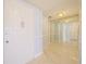 The entryway has marble floors, an entry door, and a mirrored wall at 901 S Atlantic Ave # 5, Ormond Beach, FL 32176