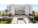 Modern condo building featuring covered parking and beach access at 901 S Atlantic Ave # 5, Ormond Beach, FL 32176