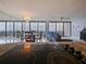 Bright and open living space with kitchen island, dining area with ocean view and living room at 901 S Atlantic Ave # 5, Ormond Beach, FL 32176