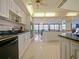 Well-lit kitchen boasts modern appliances, ample counter space, and flows seamlessly into the dining area with stunning ocean views at 901 S Atlantic Ave # 5, Ormond Beach, FL 32176