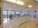 Gourmet kitchen island offering ample storage, marble countertops, and seamless flow into the dining and living area with ocean views at 901 S Atlantic Ave # 5, Ormond Beach, FL 32176