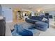 The living room has a view, ceiling fan, and an ocean themed rug at 901 S Atlantic Ave # 5, Ormond Beach, FL 32176